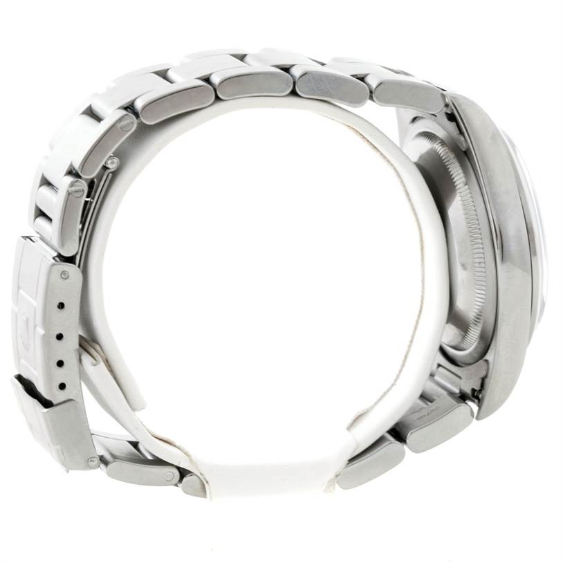 The image shows a side view of a Rolex Explorer 14270 Men's Stainless Steel Black Dial 14270 Men's Stainless Steel Black Dial watch, focusing on the metal bracelet, clasp, and part of the watch case.