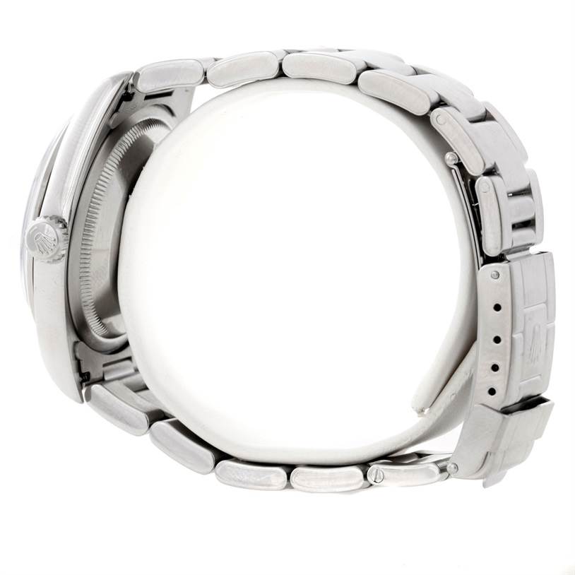 The image shows a side view of the case, bezel, and bracelet of a Rolex Explorer 14270 Men's Stainless Steel Black Dial 14270 Men's Stainless Steel Black Dial watch.