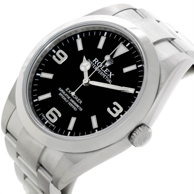 This angled view of the Rolex Explorer 214270 Men's Stainless Steel Black Dial 214270 Men's Stainless Steel Black Dial watch showcases its black dial, metal bracelet, and crown.