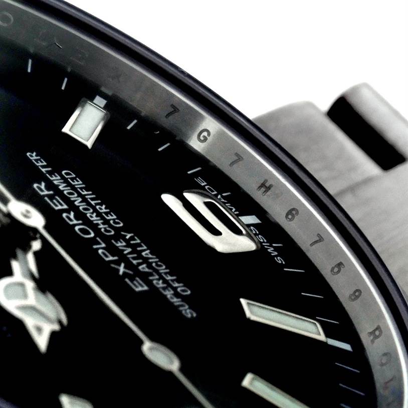 Close-up showing the dial and partial bracelet of the Rolex Explorer 214270 Men's Stainless Steel Black Dial 214270 Men's Stainless Steel Black Dial watch, highlighting numeral indices and text details.