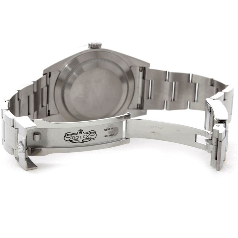 The image shows the open steel clasp and case back of a Rolex Explorer 214270 Men's Stainless Steel Black Dial 214270 Men's Stainless Steel Black Dial watch from a rear angle.