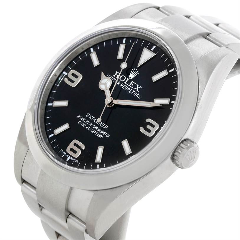 The Rolex Explorer 214270 Men's Stainless Steel Black Dial 214270 Men's Stainless Steel Black Dial watch is shown from an angle highlighting the face, crown, and part of the bracelet.
