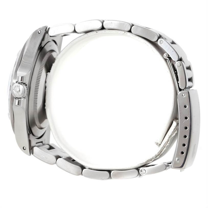 The image shows a side view of a Rolex Explorer 16570 Men's Stainless Steel White Dial 16570 Men's Stainless Steel White Dial watch, highlighting the crown, bracelet, and clasp.