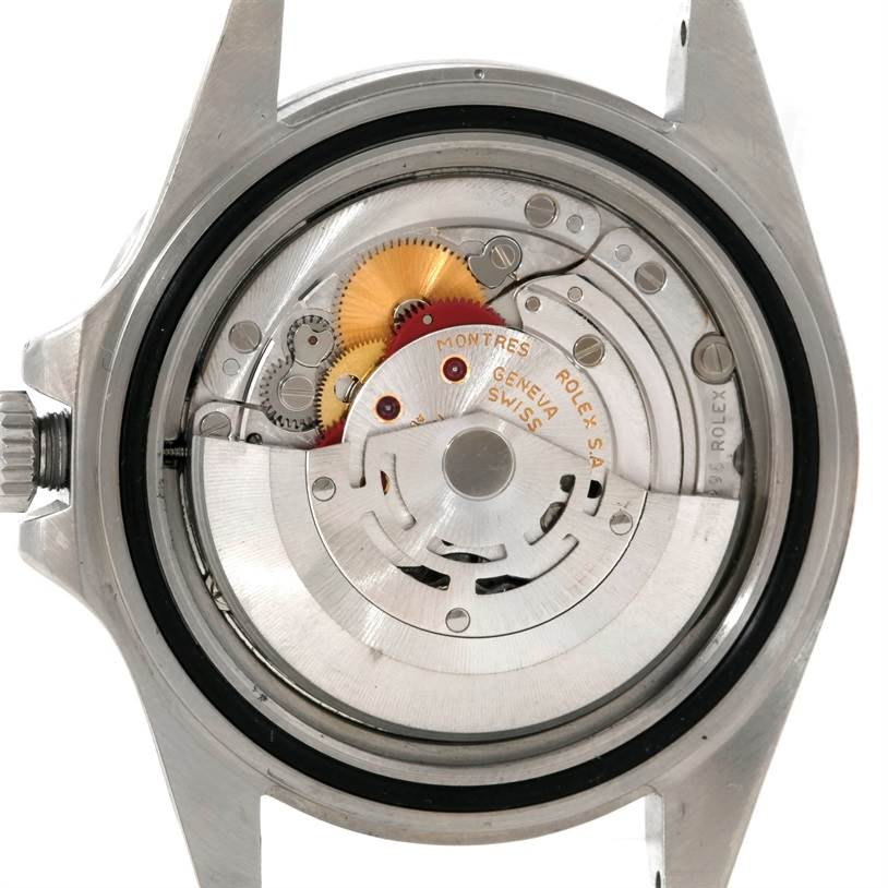 This image shows the internal mechanism of a Rolex Explorer 16570 Men's Stainless Steel Black Dial 16570 Men's Stainless Steel Black Dial watch, specifically highlighting the movement and gears from the back.