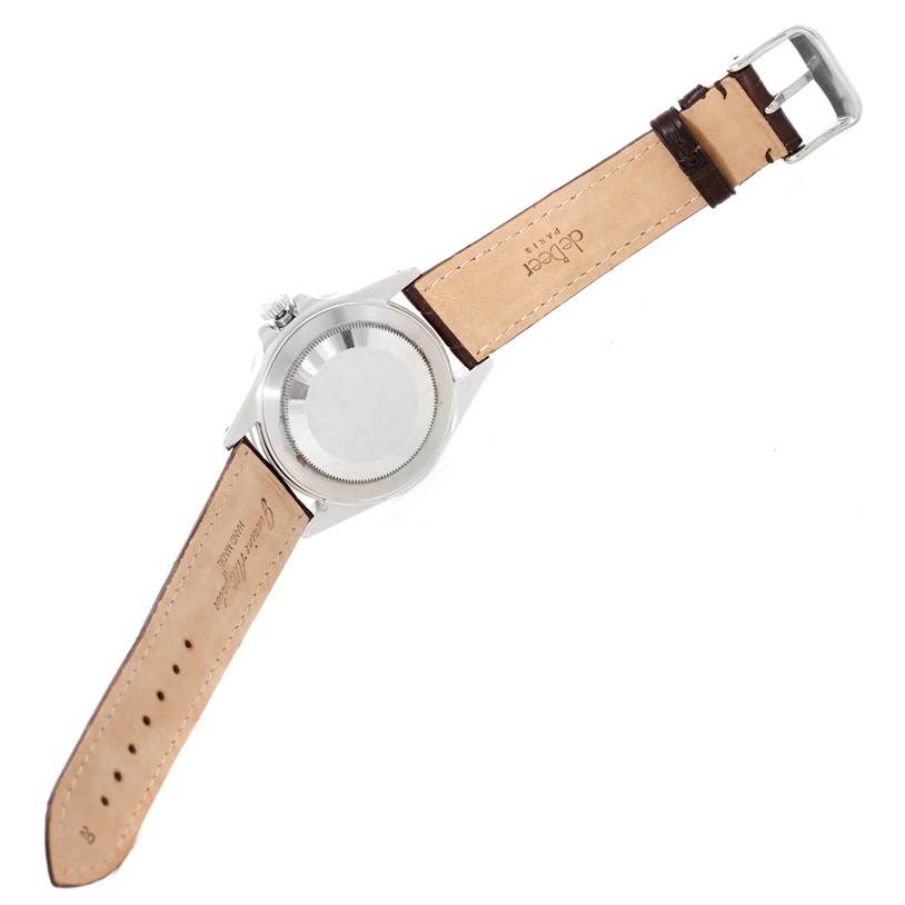 The image shows the back of a Rolex Explorer 16550 Men's Stainless Steel White Dial 16550 Men's Stainless Steel White Dial watch with a leather strap laid flat.