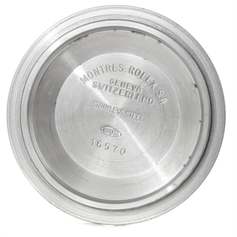 This image shows the inside of the stainless steel case back of a Rolex Explorer 16570 Men's Stainless Steel White Dial 16570 Men's Stainless Steel White Dial model 16570 watch.
