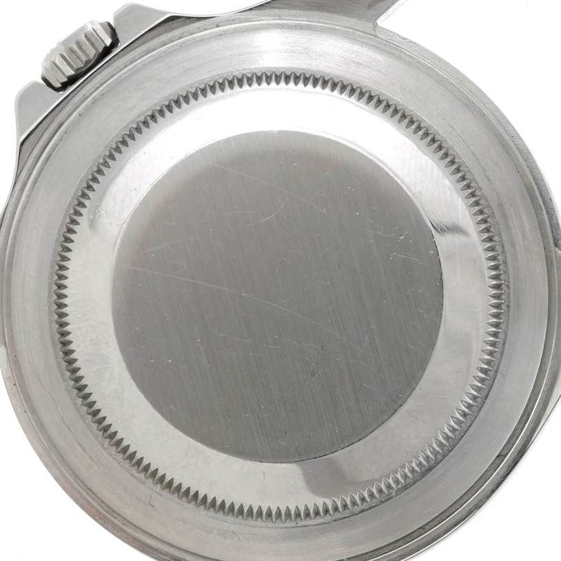 The image shows the case back and winding crown of a Rolex Explorer 16570 Men's Stainless Steel White Dial 16570 Men's Stainless Steel White Dial watch.