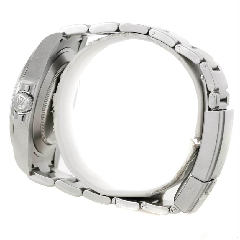 The image shows a side view of a Rolex Explorer 216570 Men's Stainless Steel Black Dial 216570 Men's Stainless Steel Black Dial watch, focusing on the case, crown, and bracelet.