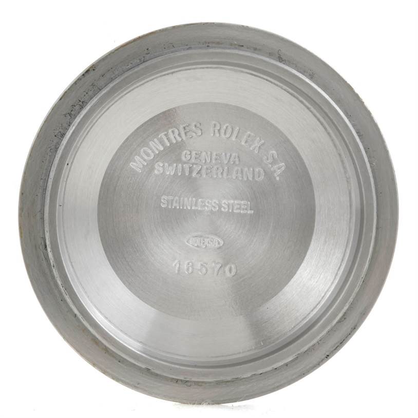 The image shows the inner side of the stainless steel case back of a Rolex Explorer 16570 Men's Stainless Steel White Dial 16570 Men's Stainless Steel White Dial model 16570.