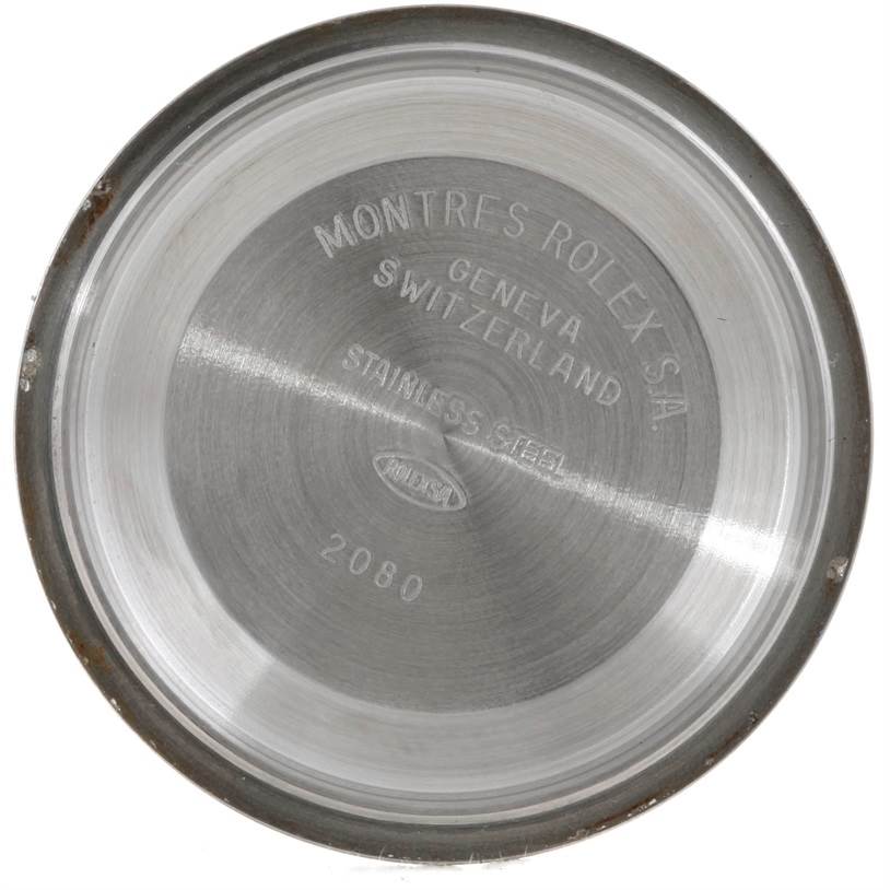 The image shows the inside of the case back of a Rolex Explorer 114270 Men's Stainless Steel Black Dial 114270 Men's Stainless Steel Black Dial watch, displaying its engraved details.