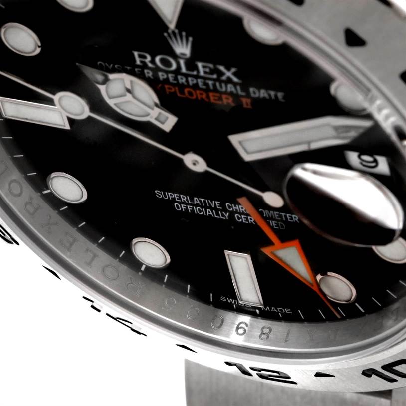 This close-up angle of the Rolex Explorer 216570 Men
s Stainless Steel Black Dial 216570 Men
s Stainless Steel Black Dial watch shows the dial, hands, bezel, and part of the date magnifier.