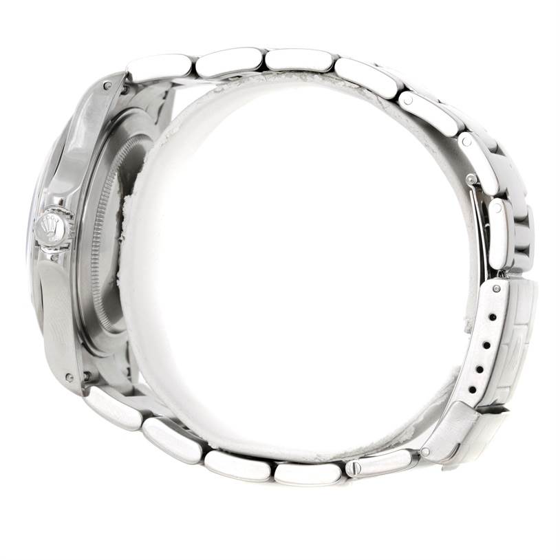 The image shows a side view of the Rolex Explorer 16570 Men's Stainless Steel White Dial 16570 Men's Stainless Steel White Dial, highlighting the crown, case back, and bracelet.