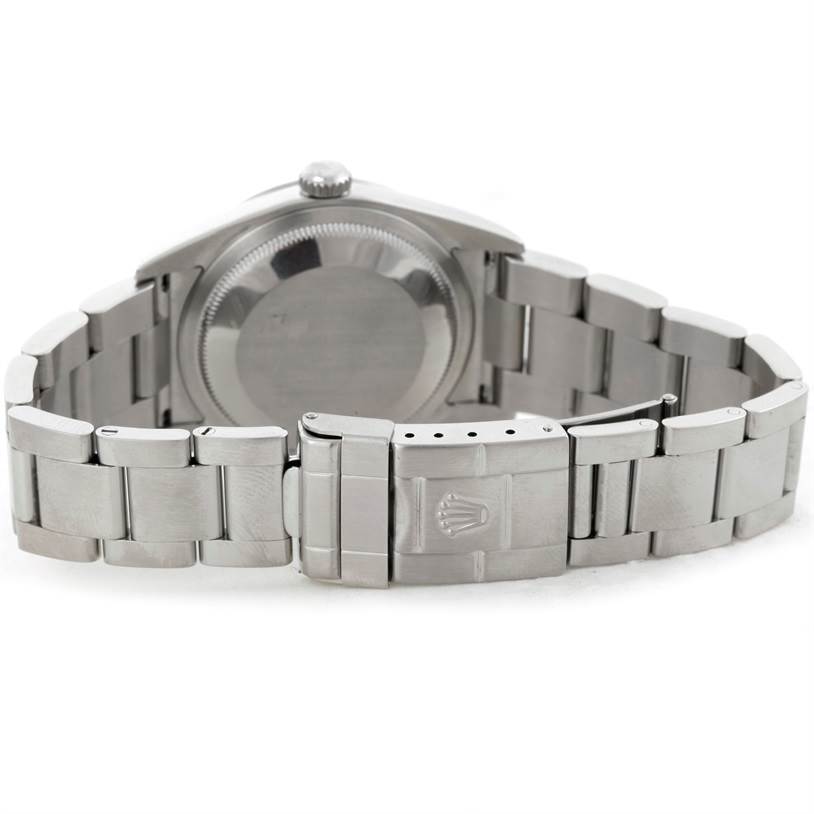 The image shows the backside and bracelet of a Rolex Explorer 114270 Men's Stainless Steel Black Dial 114270 Men's Stainless Steel Black Dial watch, highlighting the clasp and case back.