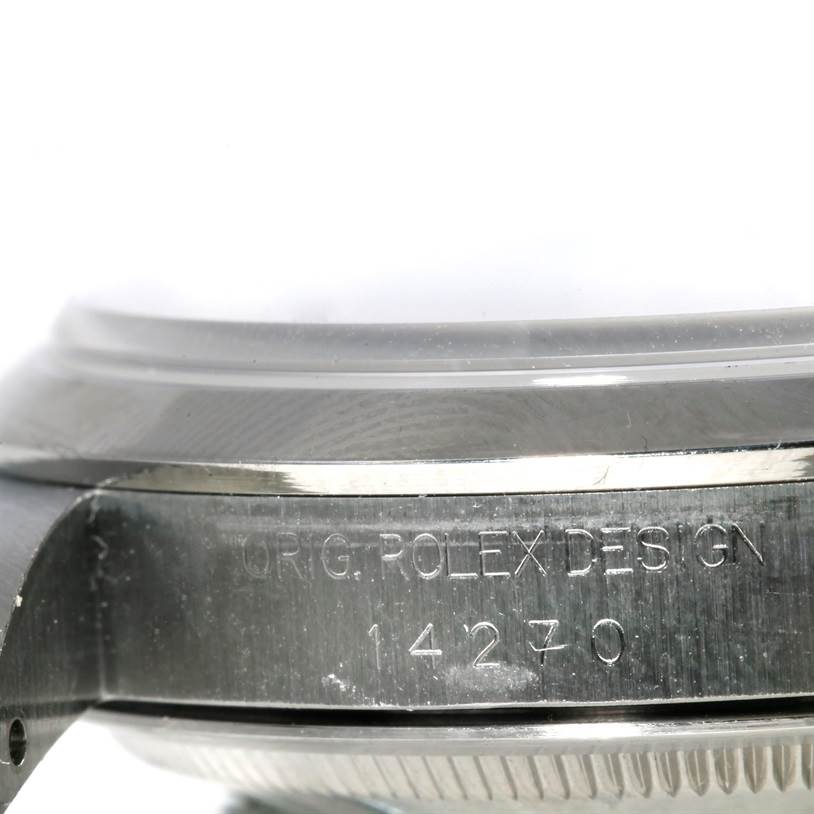 This close-up angle shows the side of a Rolex Explorer 14270 Men's Stainless Steel Black Dial 14270 Men's Stainless Steel Black Dial watch, highlighting the engraved model number and "Orig. Rolex Design".