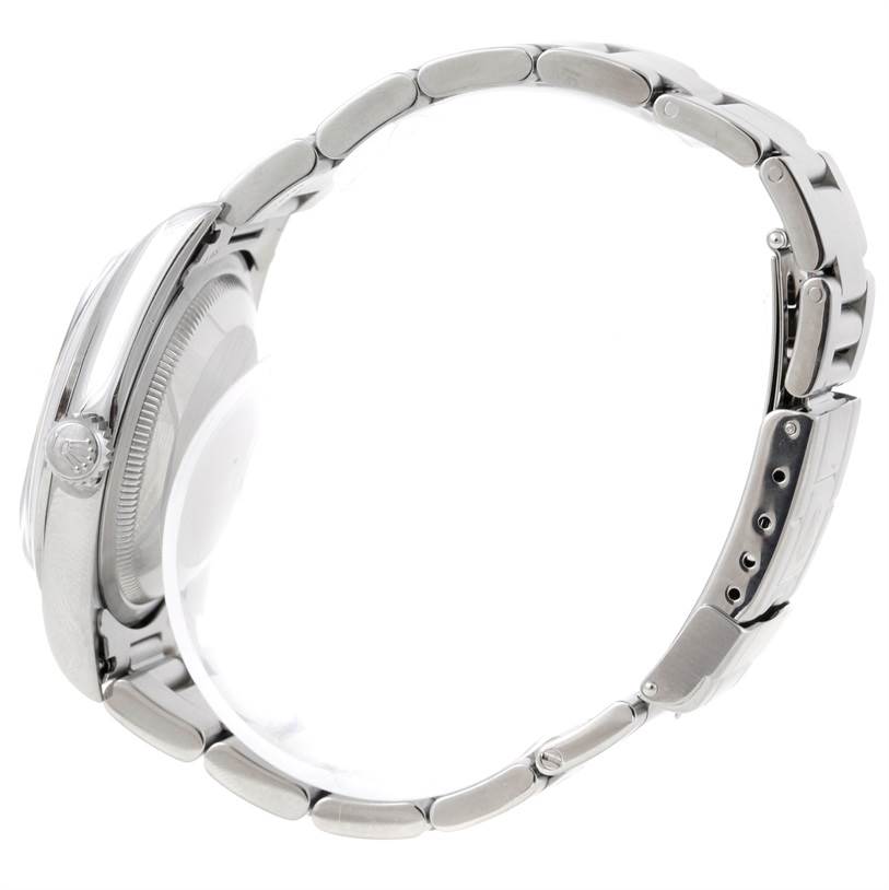 The image shows a side profile of a Rolex Explorer 14270 Men's Stainless Steel Black Dial 14270 Men's Stainless Steel Black Dial watch, focusing on its bracelet, clasp, and crown.