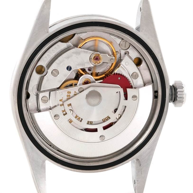 This image shows the internal mechanism of a Rolex Explorer 14270 Men's Stainless Steel Black Dial 14270 Men's Stainless Steel Black Dial watch with an open case back view.