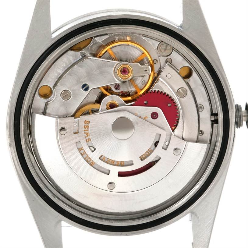 The image shows the movement and internal mechanics of a Rolex Explorer 14270 Men's Stainless Steel Black Dial 14270 Men's Stainless Steel Black Dial watch from a rear angle.