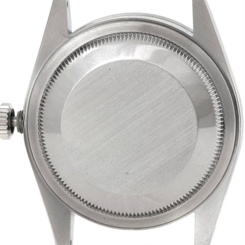 This image shows the back case and crown of a Rolex Explorer 14270 Men's Stainless Steel Black Dial 14270 Men's Stainless Steel Black Dial watch.