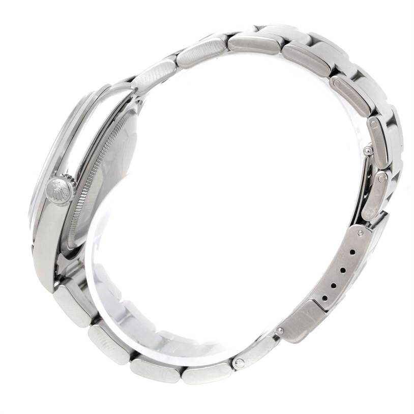 The Rolex Explorer 14270 Men's Stainless Steel Black Dial 14270 Men's Stainless Steel Black Dial watch is shown from a side angle, highlighting the case, bezel, crown, and bracelet.