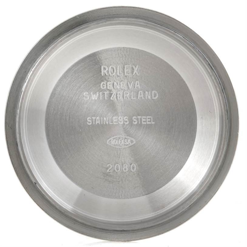 This image shows the inner side of the case back of a Rolex Explorer 114270 Men's Stainless Steel Black Dial 114270 Men's Stainless Steel Black Dial watch, highlighting the stainless steel material and engravings.