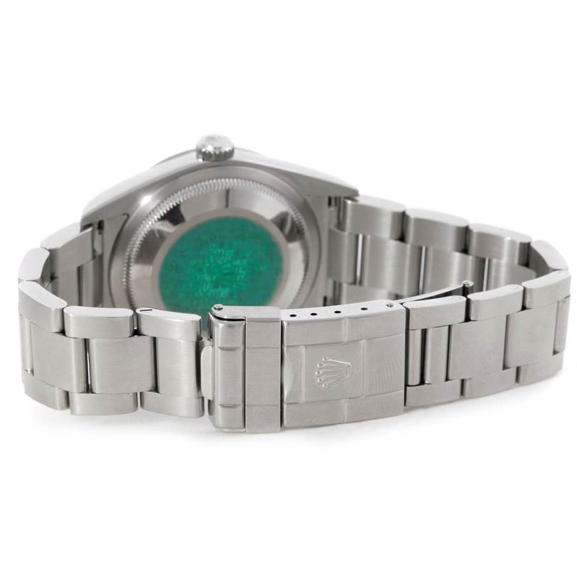 The image shows the back and clasp of a Rolex Explorer 114270 Men
s Stainless Steel Black Dial 114270 Men
s Stainless Steel Black Dial watch, viewed from a rear angle.