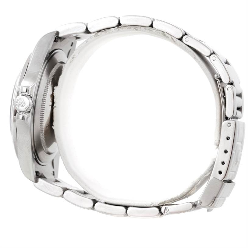 Side view of the Rolex Explorer 16570 Men's Stainless Steel Black Dial 16570 Men's Stainless Steel Black Dial watch, showcasing the bracelet, crown, and watch case.