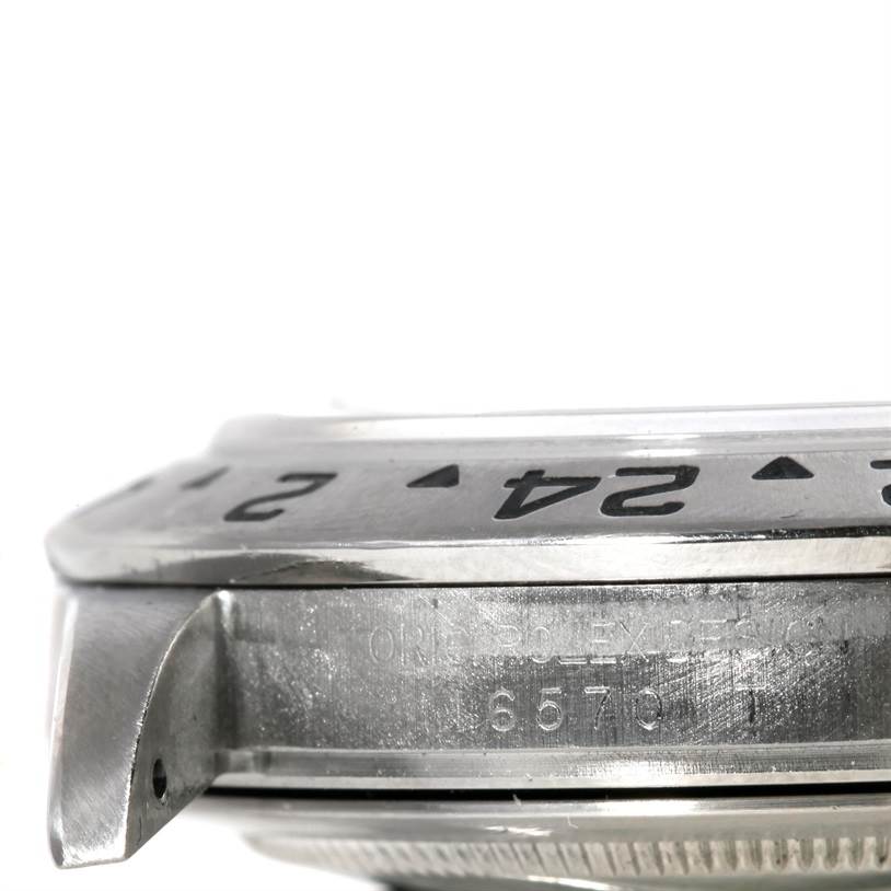 This image shows a close-up side view of the bezel and case of the Rolex Explorer 16570 Men's Stainless Steel Black Dial 16570 Men's Stainless Steel Black Dial watch.