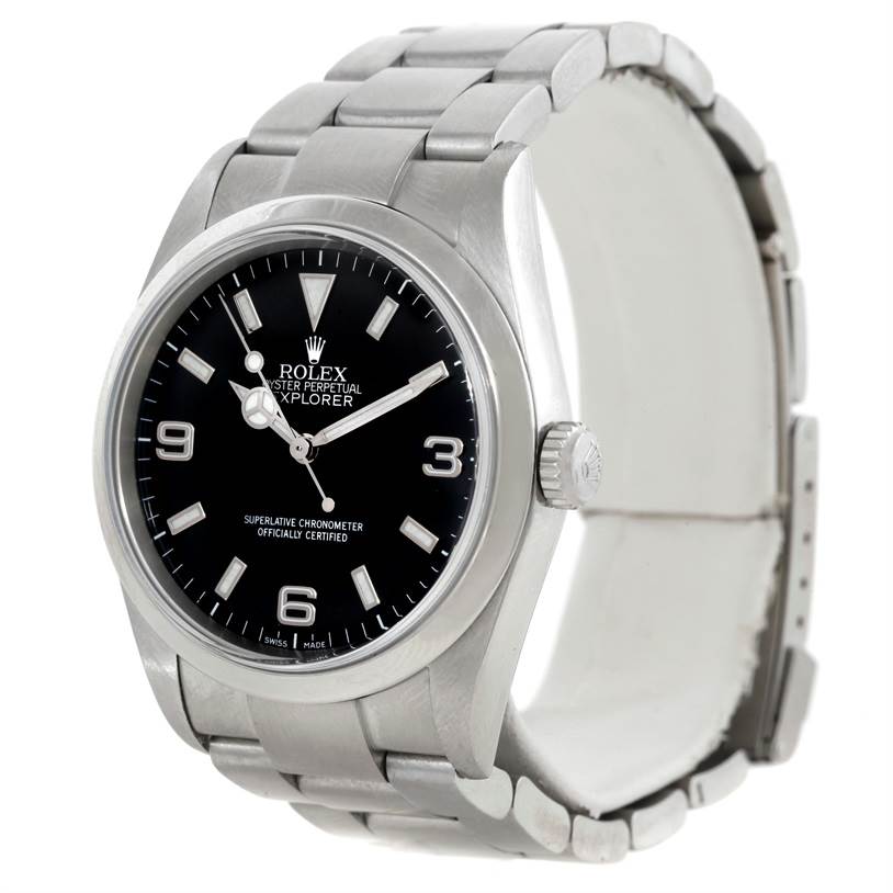 The Rolex Explorer 114270 Men's Stainless Steel Black Dial 114270 Men's Stainless Steel Black Dial watch is shown from a three-quarter angle, displaying the dial, bezel, and part of the bracelet.