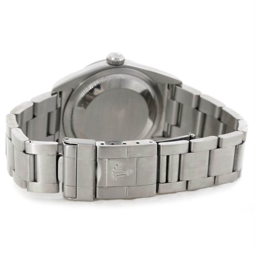 This image shows the back and bracelet of a Rolex Explorer 114270 Men's Stainless Steel Black Dial 114270 Men's Stainless Steel Black Dial watch, including the clasp and case back.