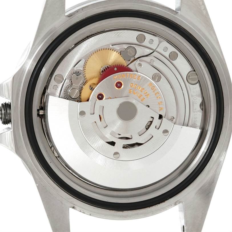 The image shows the internal mechanism and gears of a Rolex Explorer 16570 Men's Stainless Steel Black Dial 16570 Men's Stainless Steel Black Dial watch from a rear angle.