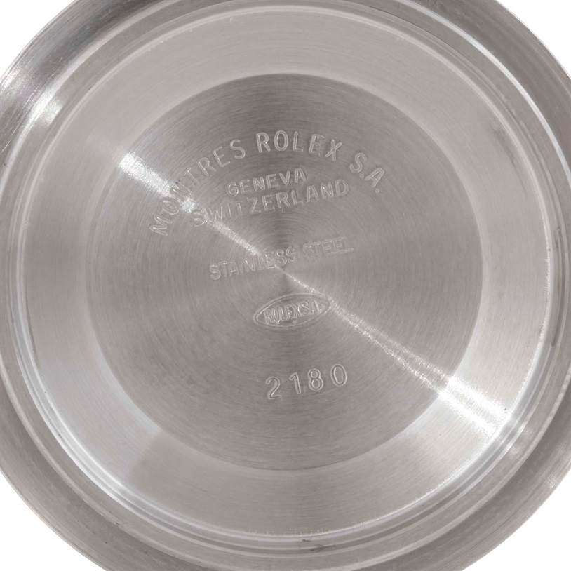 This image shows the inner case back of a Rolex Explorer 16570 Men's Stainless Steel White Dial 16570 Men's Stainless Steel White Dial watch, displaying engravings and markings.