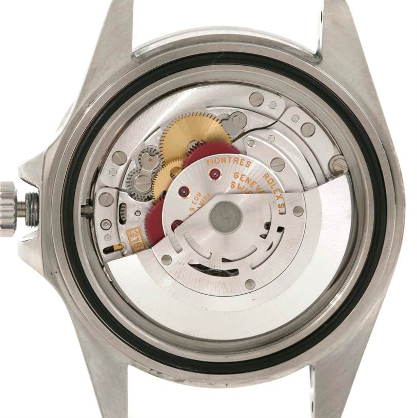 The image shows the internal movement mechanism of a Rolex Explorer 16570 Men's Stainless Steel White Dial 16570 Men's Stainless Steel White Dial watch from a back angle with the caseback removed.