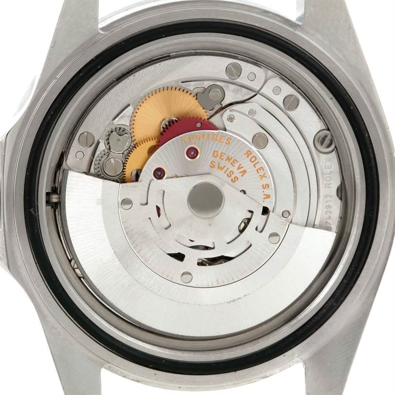 This image shows the internal mechanism of a Rolex Explorer 16570 Men's Stainless Steel White Dial 16570 Men's Stainless Steel White Dial watch from a rear angle, revealing its intricate components.