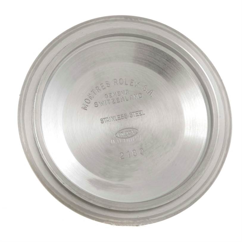 This image shows the interior case back of a Rolex Explorer 16570 Men's Stainless Steel White Dial 16570 Men's Stainless Steel White Dial watch, viewed from directly above.