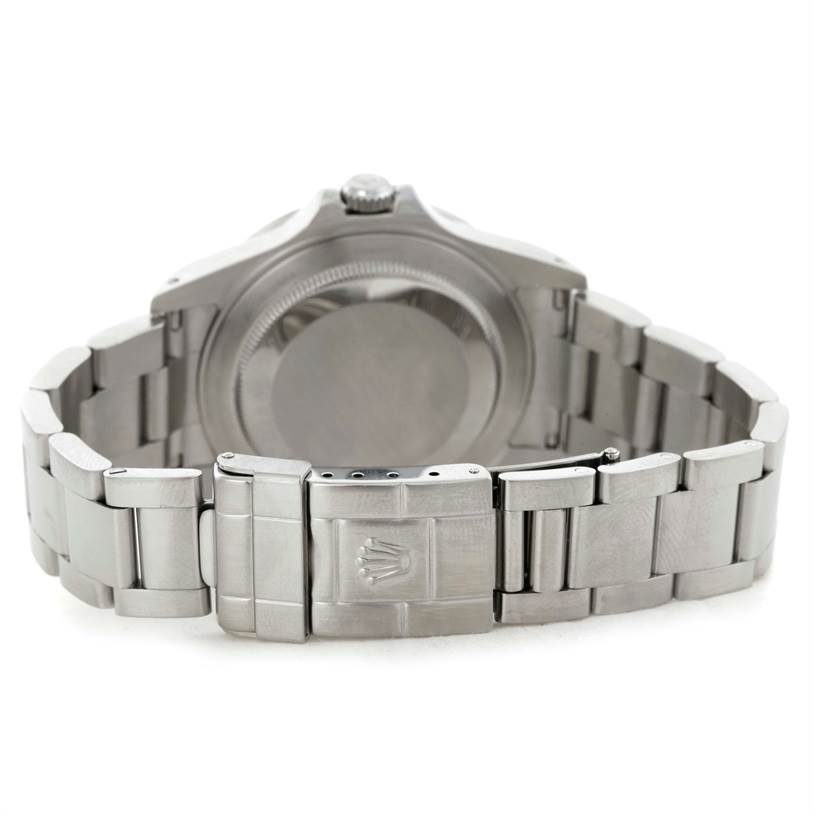 The image shows the back view of a Rolex Explorer 16570 Men's Stainless Steel White Dial 16570 Men's Stainless Steel White Dial watch, focusing on the case back and bracelet clasp.