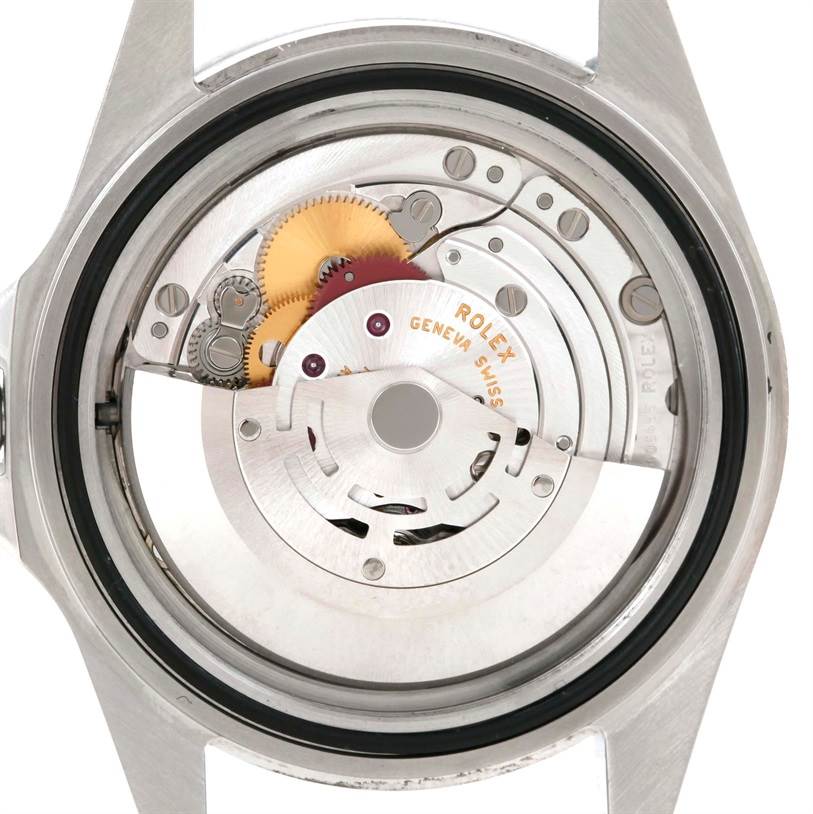 This is an angled view of the Rolex Explorer 16570 Men's Stainless Steel White Dial 16570 Men's Stainless Steel White Dial's internal movement components, showcasing the gears and the Swiss-made mechanism.