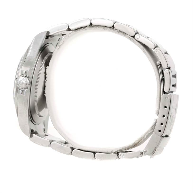 The image shows a side view of the Rolex Explorer 16570 Men's Stainless Steel White Dial 16570 Men's Stainless Steel White Dial watch, highlighting its bezel, crown, and metal bracelet.