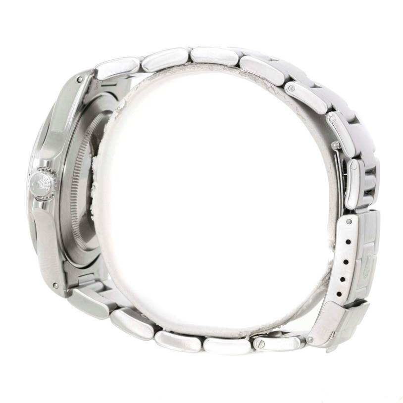 The image shows a side view of the Rolex Explorer 16570 Men's Stainless Steel White Dial 16570 Men's Stainless Steel White Dial watch, highlighting its bracelet and clasp.