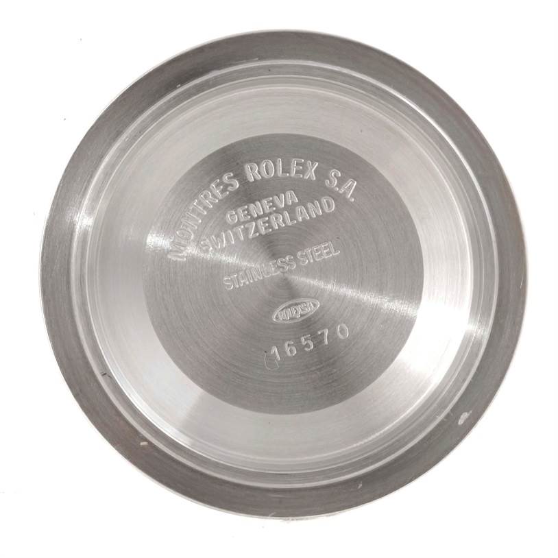 The image shows the inner case back of a Rolex Explorer 16570 Men's Stainless Steel White Dial 16570 Men's Stainless Steel White Dial watch, displaying model number 16570 and origin "Switzerland."