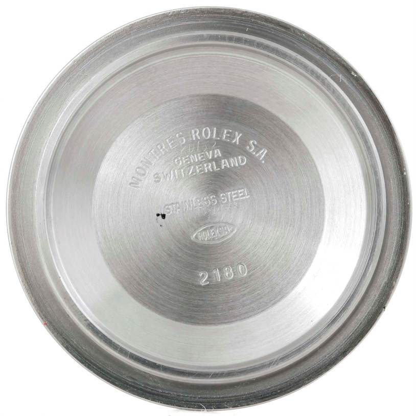 This is the inner case back of a Rolex Explorer 16570 Men's Stainless Steel Black Dial 16570 Men's Stainless Steel Black Dial model watch, showing the brand's engravings.