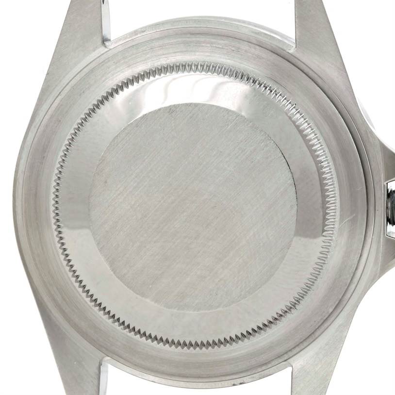 The image shows a back view of the case of a Rolex Explorer 16570 Men's Stainless Steel White Dial 16570 Men's Stainless Steel White Dial watch, focusing on the case back and lug ends.