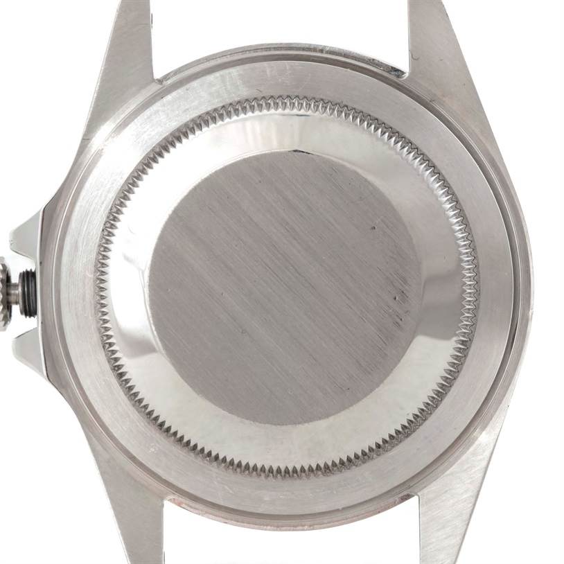 The image shows the back case of a Rolex Explorer 16570 Men's Stainless Steel White Dial 16570 Men's Stainless Steel White Dial watch viewed from the top.