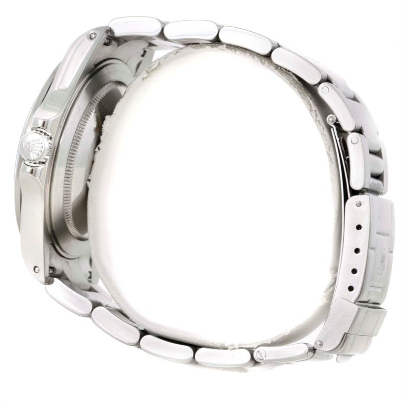 This side view image shows the clasp and crown of the Rolex Explorer 16570 Men's Stainless Steel White Dial 16570 Men's Stainless Steel White Dial watch.