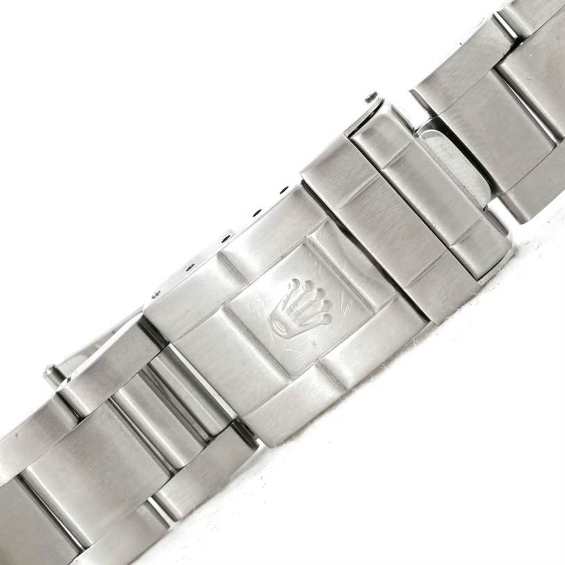 The image shows a close-up of the stainless steel bracelet and clasp of a Rolex Explorer 16570 Men
s Stainless Steel White Dial 16570 Men
s Stainless Steel White Dial watch.