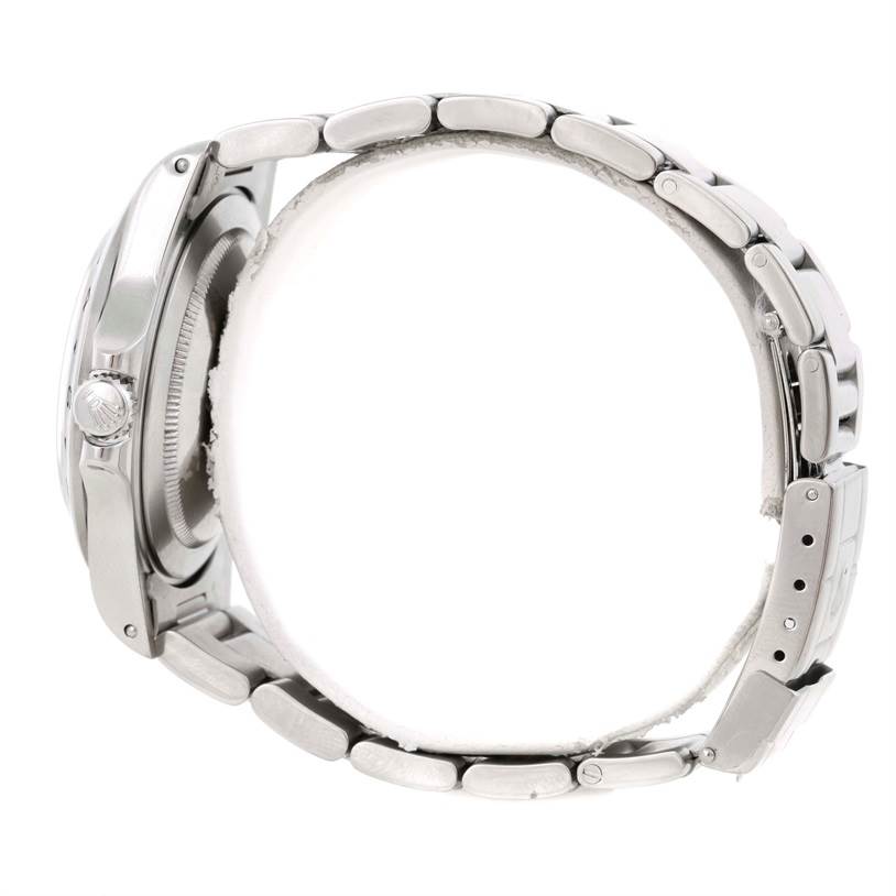 The image shows a side view of the Rolex Explorer 16570 Men
s Stainless Steel White Dial 16570 Men
s Stainless Steel White Dial watch, highlighting the bezel, crown, and bracelet links.