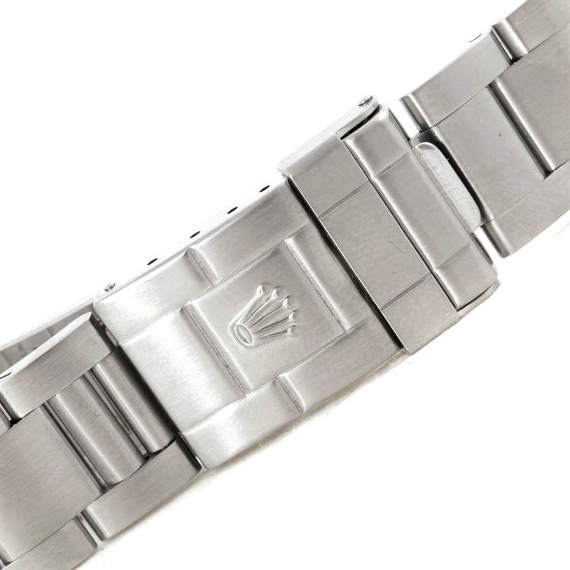 The image shows the clasp and part of the stainless steel bracelet of a Rolex Explorer 16570 Men's Stainless Steel Black Dial 16570 Men's Stainless Steel Black Dial watch.