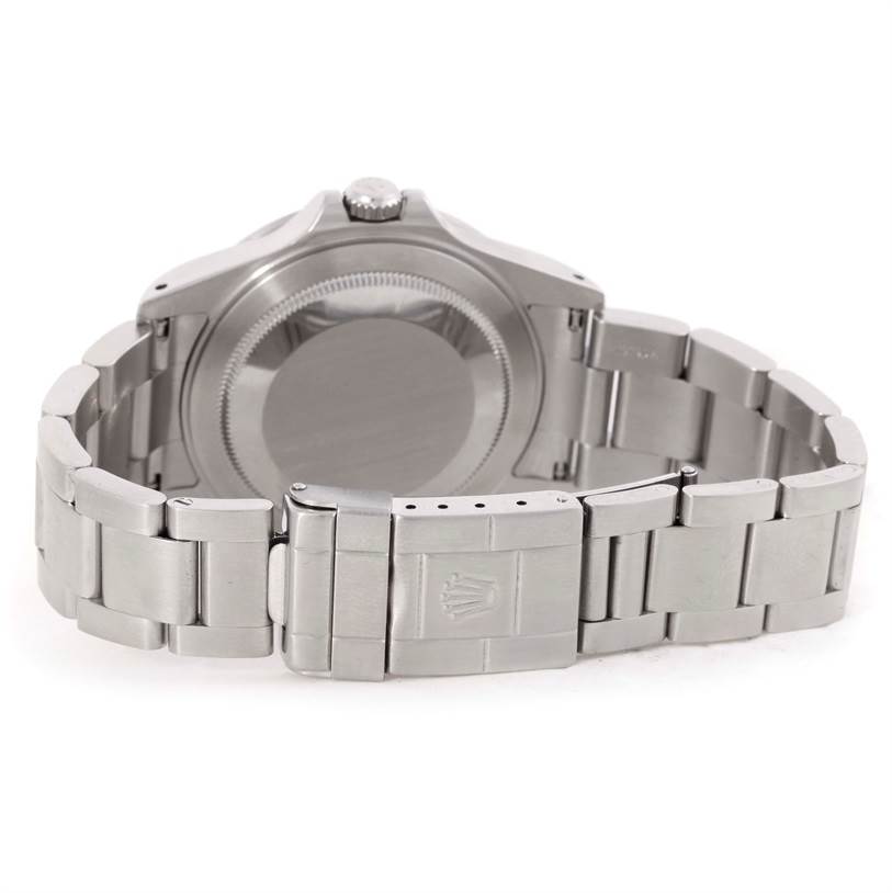 The image shows the back view of a Rolex Explorer 16570 Men's Stainless Steel Black Dial 16570 Men's Stainless Steel Black Dial watch, featuring its case back, bracelet, and clasp.