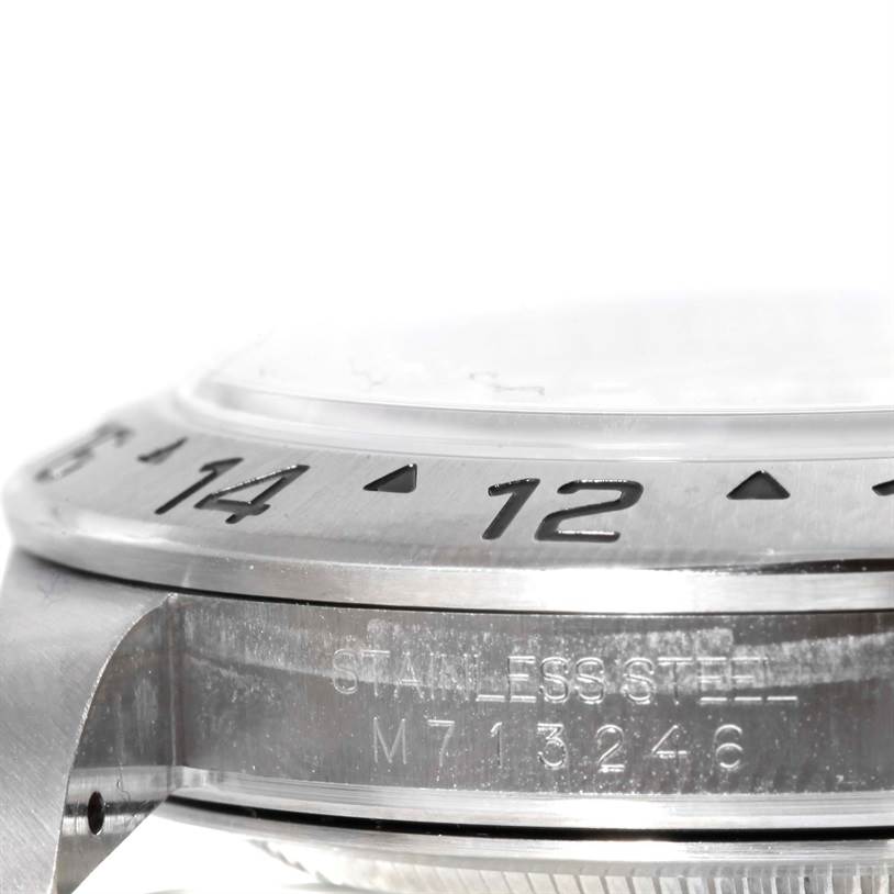 This image shows a close-up of the bezel, crystal, and side case of a Rolex Explorer 16570 Men's Stainless Steel White Dial 16570 Men's Stainless Steel White Dial model watch.