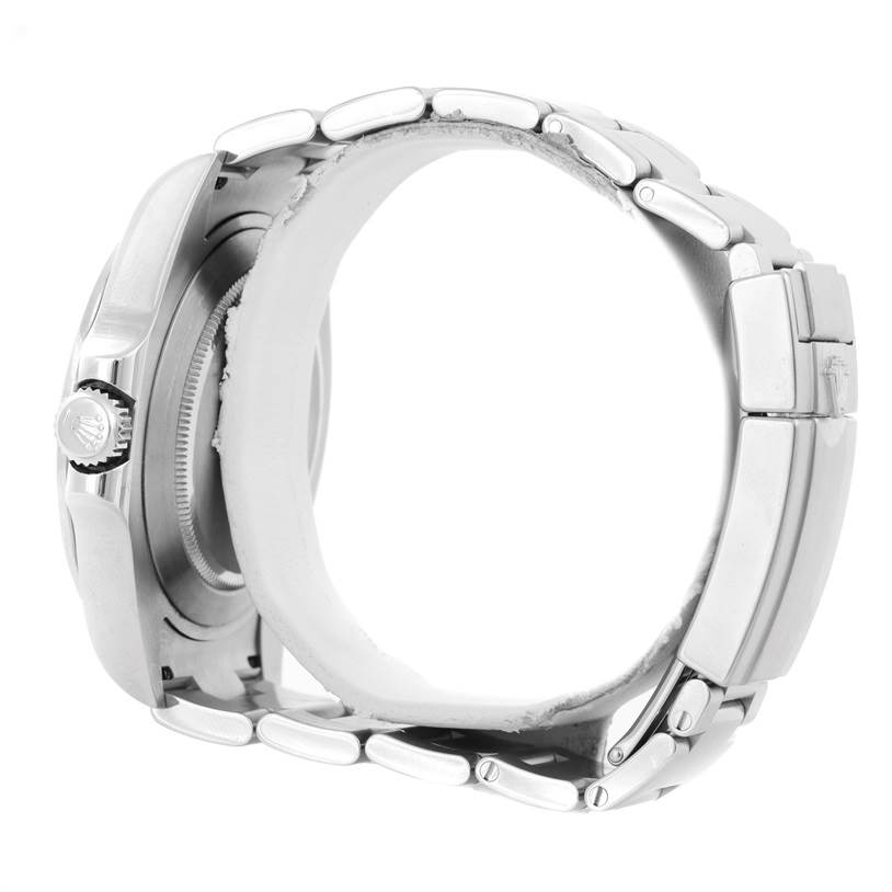 This side view of the Rolex Explorer 216570 Men's Stainless Steel Black Dial 216570 Men's Stainless Steel Black Dial watch displays the watch case, crown, and bracelet.