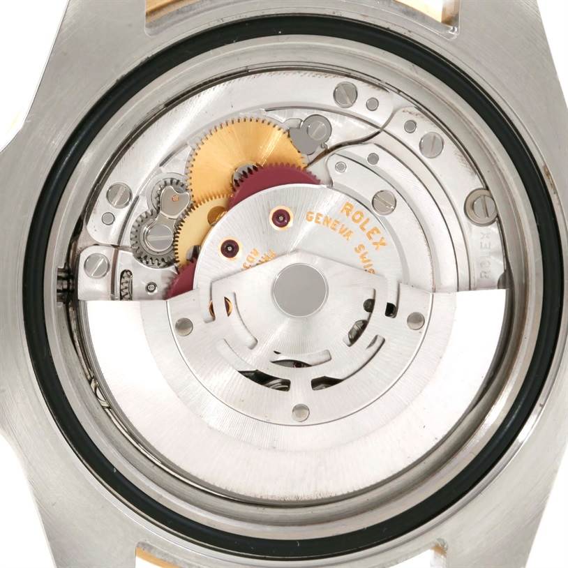 This image shows the internal movement mechanics of a Rolex GMT-Master 116713 Men's Stainless Steel Black Dial 116713 Men's Stainless Steel Black Dial watch, viewed from the back.